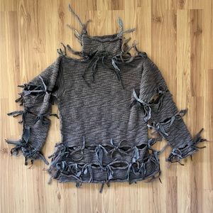 Olivvi by Cindy Taylor hand knit sweater with holes and random fringe.